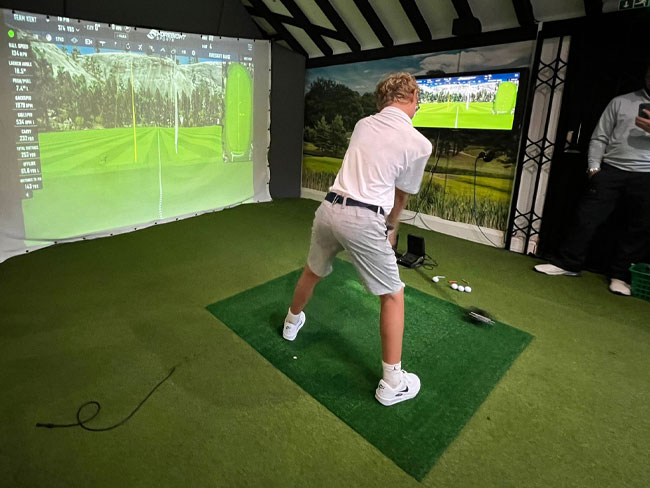 Golfer on simulator