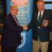 <KGU President Jim Pocknell presenting  a plaque to Kings Hill Golf Club Captain Malcolm Honey 